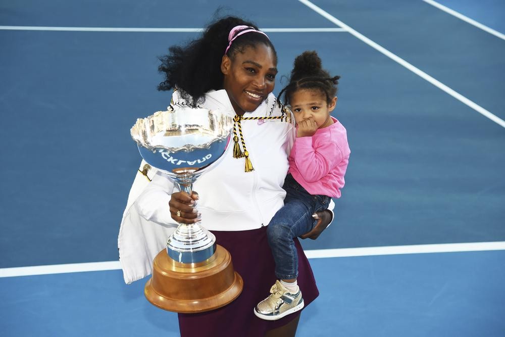 Serena WFILE - Serena Williams holds her daughter Alexis Olympia Ohanian Jr., and the ASB trophy after winning her singles finals match against Jessica Pegula at the ASB Classic in Auckland, New Zealand, Sunday, Jan 12, 2020. Serena Williams says she is ready to step away from tennis after winning 23 Grand Slam titles, turning her focus to having another child and her business interests. “I’m turning 41 this month, and something’s got to give,” Williams wrote in an essay released Tuesday, Aug. 9, 2022, by Vogue magazine. (Chris Symes/Photosport via AP, File)illiams